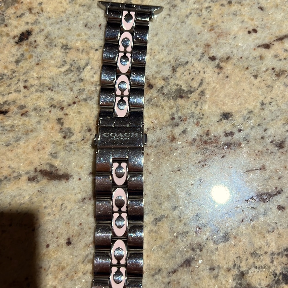Coach 38mm apple watch strap in stainless with pink “C” measures 6”